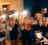 Audience at an event capturing content on phones across multiple social channels